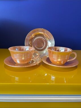 Fire King Peach Lustre cups and plates in Three-Band Pattern
